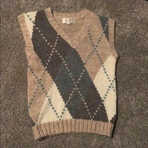A sweater vest with a diamond pattern